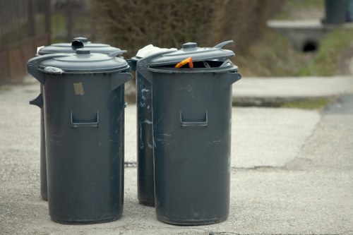 Business professionals managing waste in Feltham office