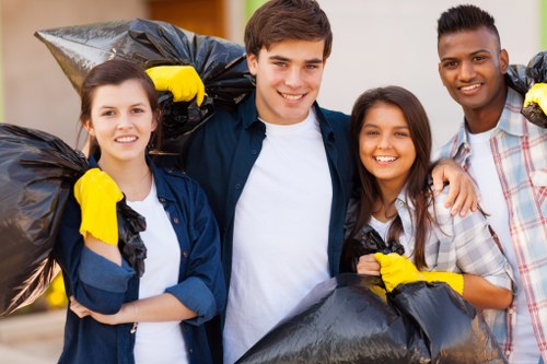 Professionals conducting garage clearance in Feltham